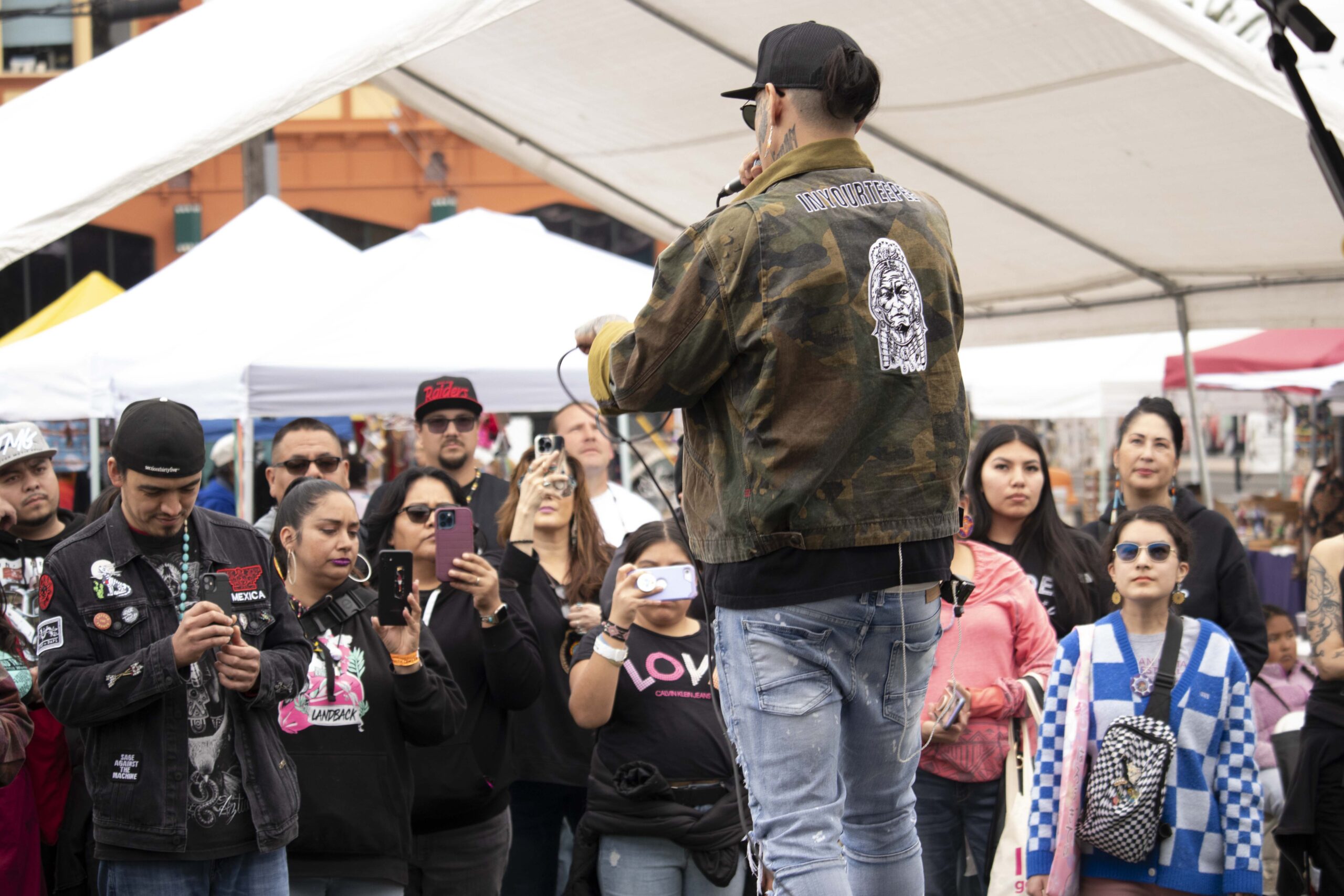 Singer and Rapper performing at Indigenous Red Market